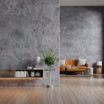 Leather sofa and a wooden table in living room interior with plant,concrete wall for TV.3d rendering